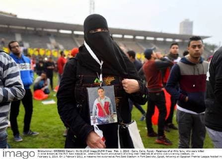 Feb. 1, 2016 - Cairo, Cairo, Egypt - Relatives of al-Ahly fans, who were killed in what known as the Port Said massacre , attend the fourth anniversary of killing their relatives at al-Ahly club s training stadium, on February 1, 2016. On 1 February 2012, a massive riot occurred at Port Said Stadium in Port Said city, Egypt, following an Egyptian Premier League football match between El Masry and El Ahly clubs. At least 74 people were killed and more than 500 were injured after thousands of El Masry spectators stormed the stadium stands and the pitch Cairo Egypt - ZUMAap3_