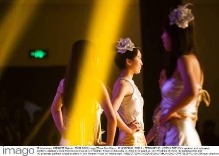 CHANGCHUN, CHINA - FEBRUARY 03: (CHINA OUT) Policewomen and prisoners perform onstage during the fashion show at Jilin Women Prison on February 3, 2016 in Changchun, Jilin Province of China. 40 policewomen and 40 prisoners perform a fashion show in Jilin Women Prison on Wednesday.  CFP479100471