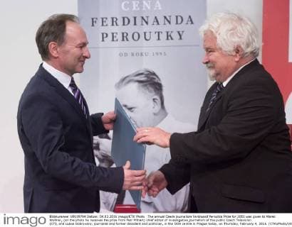 The annual Czech journalism Ferdinand Peroutka Prize for 2015 was given to Marek Wollner, (on the photo he receives the prize from Petr Pithart) chief editor of investigative journalism of the public Czech Television (CT), and Lubos Dobrovsky, journalist and former dissident and politician, in the DOX centre in Prague today, on Thursday, February 4, 2016. (CTKxPhoto VitxSimanek) CTKPhotoP201602040981601  VIS 002