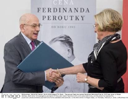 The annual Czech journalism Ferdinand Peroutka Prize for 2015 was given to Marek Wollner, chief editor of investigative journalism of the public Czech Television (CT), and Lubos Dobrovsky, (on the photo he receives the prize from Libuse Koubska) journalist and former dissident and politician, in the DOX centre in Prague today, on Thursday, February 4, 2016. (CTKxPhoto VitxSimanek) CTKPhotoP201602040986401  VIS 003