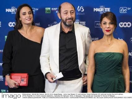 Actor Kad Merad (C) and actress Tania Garbarski (R) pictured during the sixth edition of the Magritte du Cinema awards ceremony, Saturday 06 February 2016, in Brussels. The awards are rewarded to movies of Belgian French-speaking producers.  LAURIExDIEFFEMBACQ 04788985