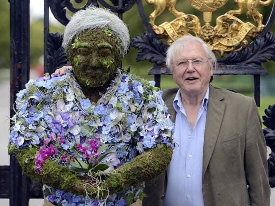 IMAGO ICONS: Sir David Attenborough May 17, 2012 - Kew, London, UK - Kew, UK SIR DAVID ATTENBOROUGH looks at the sculpture. A Photocall at Royal Botanic Gardens, Kew with Sir David Attenborough as he unveils and poses with a life-size sculpture of himself created by RHS Young Chelsea Florist of the Year 2009, 10 & 11 - Joe Massie. The artwork has been commissioned to celebrate the broadcaster s three part series Kingdom of Plants 3D with David Attenborough - which was filmed entirely at the Royal Botanic Gardens, Kew.. Photo credit : Stephen Simpson LNP  - ZUMAl94_