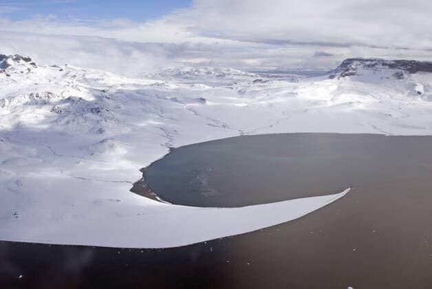 Aerial view of spit on James Ross Island. Antarctic Peninsula. February 2008. Taken on location for BBC tv series Life  1407438 MarthaxHolmes
