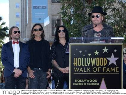 Alex Gonzalez, Sergio Vallin, Juan Calleros and Fher Olvera (L-R), members of the Mexican rock band Mana make comments during an unveiling ceremony honoring the group with the 2,573rd star on the Hollywood Walk of Fame in Los Angeles on February 10, 2016.  LAP2016021009 JIMxRUYMEN