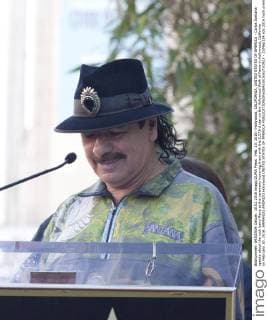 Feb. 10, 2016 - Hollywood, CALIFORNIA, UNITED STATES OF AMERICA - Carlos Santana speaks about the rock band Mana at the ceremony honoring them with the 2,573rd star on the Hollywood Walk of Fame in Hollywood, California on February 10, 2016..ARMANDO ARORIZO Hollywood UNITED STATES OF AMERICA - ZUMAp124
