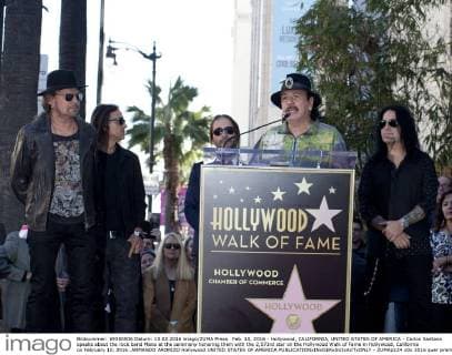 Feb. 10, 2016 - Hollywood, CALIFORNIA, UNITED STATES OF AMERICA - Carlos Santana speaks about the rock band Mana at the ceremony honoring them with the 2,573rd star on the Hollywood Walk of Fame in Hollywood, California on February 10, 2016..ARMANDO ARORIZO Hollywood UNITED STATES OF AMERICA - ZUMAp124