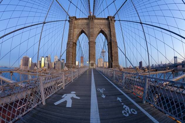 Wide angle view of Brooklyn Bridge looking towards downtown Financial district of Manhattan, New York City, USA 2009  1419211 GavinxHellier