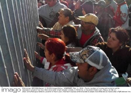 MONTERREY, Feb. 11, 2016 -- Family members of inmates and residents wait for information outside of the Topo Chico prison after a fight between inmates, in Monterrey, in the state of Nuevo Leon, Mexico, on Feb. 11, 2016. Jaime Rodriguez Calderon, governor of Nuevo Leon, informed in a press conference that 52 people were killed and 12 injured after a fight between two rival fractions of inmates broke in the Topo Chico prison. Str) (ce) MEXICO-MONTERREY-SECURITY-PRISON e STR 