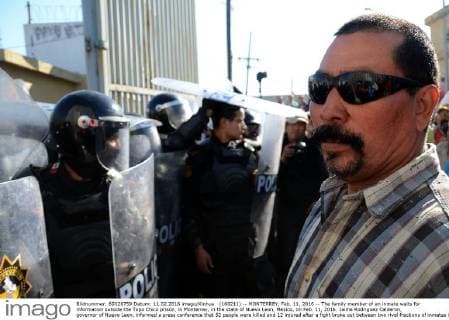 (160211) -- MONTERREY, Feb. 11, 2016 -- The family member of an inmate waits for information outside the Topo Chico prison, in Monterrey, in the state of Nuevo Leon, Mexico, on Feb. 11, 2016. Jaime Rodriguez Calderon, governor of Nuevo Leon, informed a press conference that 52 people were killed and 12 injured after a fight broke out between two rival fractions of inmates inside the Topo Chico prison. ABC) (ce) MEXICO-MONTERREY-SECURITY-PRISON e ABC 