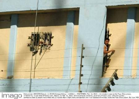 (160211) -- MONTERREY, Feb. 11, 2016 -- An inmate is seen at the Topo Chico prison, in Monterrey, in the state of Nuevo Leon, Mexico, on Feb. 11, 2016. Jaime Rodriguez Calderon, governor of Nuevo Leon, informed a press conference that 52 people were killed and 12 injured after a fight broke out between two rival fractions of inmates inside the Topo Chico prison. Str) (ce) MEXICO-MONTERREY-SECURITY-PRISON e Str 