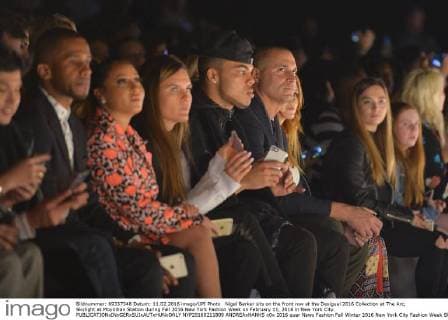 Nigel Barker sits on the front row at the Desigual 2016 Collection at The Arc, Skylight at Moynihan Station during Fall 2016 New York Fashion Week on February 11, 2016 in New York City.  NYP20160211809 ANDREAxHANKS