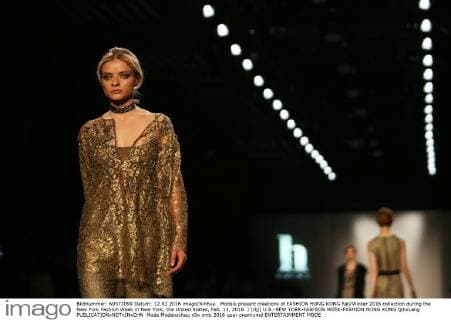 Models present creations of FASHION HONG KONG Fall Winter 2016 collection during the New York Fashion Week in New York, the United States, Feb. 12, 2016. ) (djj) U.S.-NEW YORK-FASHION WEEK-FASHION HONG KONG QinxLang 