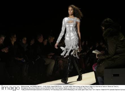 A model walks the runway at the Herve Leger By Max Azria Fashion Show at The Arc, Skylight at Moynihan Station during Fall 2016 New York Fashion Week on February 13, 2016 in New York City.  NYP20160213105 JOHNxANGELILLO