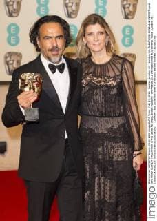 Feb. 14, 2016 - London, London, UK - London, UK. ALEJANDRO GONZALEZ INARRITU and wife MARIA ELANDIA HAGERMANN arrive carpet for the EE British Academy Film Awards 2016 after party held at Grosvenor House . London, UK. London UK  - ZUMAl94_