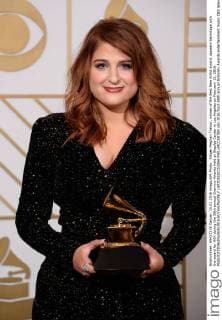 Singer Meghan Trainor, winner of the Best New Artist award, appears backstage with the award for XXX during the 58th annual Grammy Awards held at Staples Center in Los Angeles on February 15, 2016.  LAP201602151066 PHILxMCCARTEN