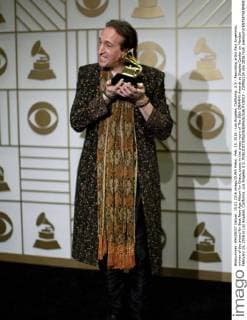 Feb. 15, 2016 - Los Angeles, California, U.S - Recording artist Paul Avgerinos, winner of the award for Best New Age Album for Grace, poses in the press room of The 58th GRAMMY Awards at Staples Center on Monday February 15, 2016 in Los Angeles, California. Los Angeles U.S. - ZUMAp124