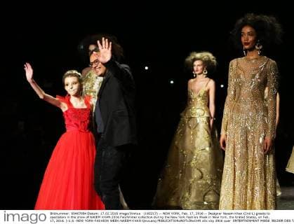 (160217) -- NEW YORK, Feb. 17, 2016 -- Designer Naeem Khan (2nd L) greets to spectators in the show of NAEEM KHAN 2016 Fall Winter collection during the New York Fashion Week in New York, the United States, on Feb. 17, 2016. ) U.S.-NEW YORK-FASHION WEEK-NAEEM KHAN QinxLang 