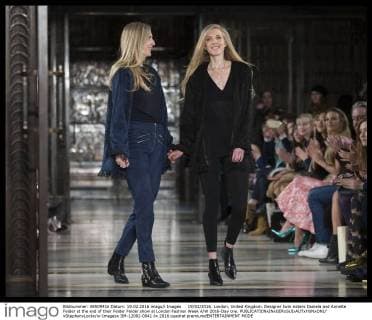 . 19 02 2016. London, United Kingdom. Designer twin sisters Daniela and Annette Felder at the end of their Felder Felder show at London Fashion Week A W 2016-Day one.  xStephenxLockx xi-Imagesx IIM-12002-0041