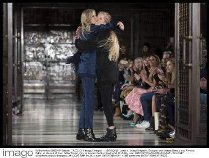 . 19 02 2016. London, United Kingdom. Designer twin sisters Daniela and Annette Felder at the end of their Felder Felder show at London Fashion Week A W 2016-Day one.  xStephenxLockx xi-Imagesx IIM-12002-0044