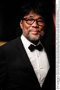 (160220) -- BERLIN, Feb. 20, 2016 -- Mark Lee Ping-Bing, Cinematographer of the movie Crosscurrent (Chang Jiang Tu), poses on the red carpet ahead of the awards ceremony of the 66th Berlinale International Film Festival in Berlin, Feb. 20, 2016. ) GERMANY-BERLIN-BERLINALE INTERNATIONAL FILM FESTIVAL-AWARDS CEREMONY ZhangxFan 