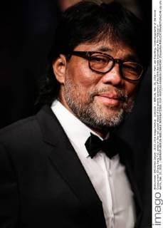 (160220) -- BERLIN, Feb. 20, 2016 -- Mark Lee Ping-Bing, Cinematographer of the movie Crosscurrent (Chang Jiang Tu), poses on the red carpet ahead of the awards ceremony of the 66th Berlinale International Film Festival in Berlin, Feb. 20, 2016. ) GERMANY-BERLIN-BERLINALE INTERNATIONAL FILM FESTIVAL-AWARDS CEREMONY ZhangxFan 