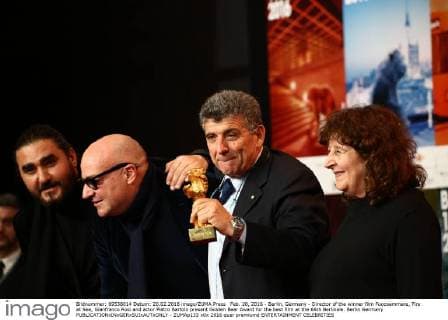 Feb. 20, 2016 - Berlin, Germany - Director of the winner film Fuocoammare, Fire at Sea, Gianfranco Rosi and actor Pietro Bartolo present Golden Bear Award for the best film at the 66th Berlinale. Berlin Germany - ZUMAp133