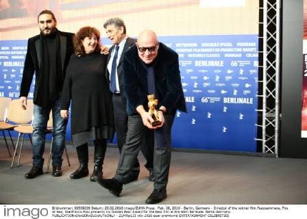 Feb. 20, 2016 - Berlin, Germany - Director of the winner film Fuocoammare, Fire at Sea, Gianfranco Rosi presents his Golden Bear Award for the best film at the 66th Berlinale. Berlin Germany - ZUMAp133