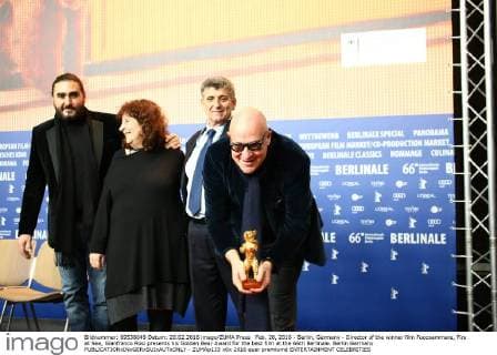 Feb. 20, 2016 - Berlin, Germany - Director of the winner film Fuocoammare, Fire at Sea, Gianfranco Rosi presents his Golden Bear Award for the best film at the 66th Berlinale. Berlin Germany - ZUMAp133