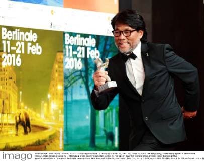 (160216) -- BERLIN, Feb. 20, 2016 -- Mark Lee Ping-Bing, cinematographer of the movie Crosscurrent (Chang Jiang Tu), attends a press conference after receiving his Silver Bear for Outstanding Artistic Contribution at the awards ceremony of the 66th Berlinale International Film Festival in Berlin, Germany, Feb. 20, 2016. ) GERMANY-BERLIN-BERLINALE INTERNATIONAL FILM FESTIVAL-AWARDS CEREMONY-MARK LEE LuoxHuanhuan 