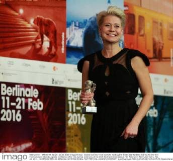 Danish actress Trine Dyrholm holding the Silver Bear for Best Actress for the film The Commune attends a press conference after the awards ceremony of the 66th Berlinale International Film Festival in Berlin, Germany, Feb. 20, 2016. ) GERMANY-BERLIN-BERLINALE INTERNATIONAL FILM FESTIVAL-AWARDS CEREMONY LuoxHuanhuan 