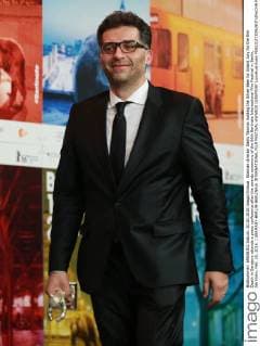 Bosnian director Danis Tanovic holding the Silver Bear for Grand Jury for the film Death in Sarajevo attends a press conference after the awards ceremony of the 66th Berlinale International Film Festival in Berlin, Germany, Feb. 20, 2016. ) GERMANY-BERLIN-BERLINALE INTERNATIONAL FILM FESTIVAL-AWARDS CEREMONY LuoxHuanhuan 