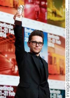 Tomasz Wasilewski holding the Silver Bear for Best Screenplay for the film United States of Love attends a press conference after the awards ceremony of the 66th Berlinale International Film Festival in Berlin, Germany, Feb. 20, 2016. ) GERMANY-BERLIN-BERLINALE INTERNATIONAL FILM FESTIVAL-AWARDS CEREMONY LuoxHuanhuan 