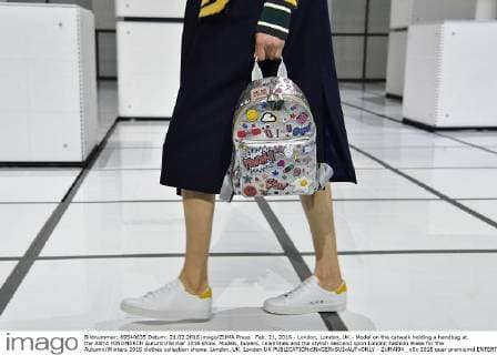 Feb. 21, 2016 - London, London, UK - Model on the catwalk holding a handbag at the ANYA HINDMARCH Autumn Winter 2016 show. Models, buyers, celebrities and the stylish descend upon London Fashion Week for the Autumn Winters 2016 clothes collection shows. London, UK. London UK  - ZUMAl94_