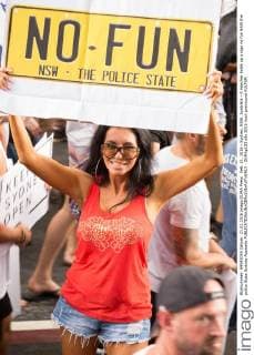 Feb. 21, 2016 - Sydney, NSW, Australia - A marcher holds up a sign no fun NSW the police State Sydney Australia - ZUMAp133
