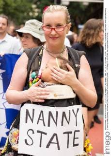 Feb. 21, 2016 - Sydney, NSW, Australia - A protester with baby and sign declaring a nanny state Sydney Australia - ZUMAp133