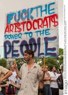 Feb. 21, 2016 - Sydney, NSW, Australia - A protester with a blunt message for the Aristocrats Sydney Australia - ZUMAp133