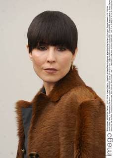 Swedish actress Noomi Rapace attending the Burberry Prorsum Womenswear A W 2016 on West Albert Lawn in Kensington Gardens, London. FEBRUARY 22nd 2016  PTYx16459