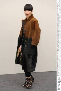 Swedish actress Noomi Rapace attending the Burberry Prorsum Womenswear A W 2016 on West Albert Lawn in Kensington Gardens, London. FEBRUARY 22nd 2016  PTYx16459