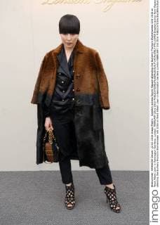 Swedish actress Noomi Rapace attending the Burberry Prorsum Womenswear A W 2016 on West Albert Lawn in Kensington Gardens, London. FEBRUARY 22nd 2016  PTYx16459