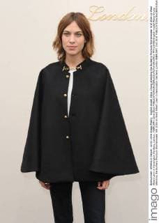 English model Alexa Chung attending the Burberry Prorsum Womenswear A W 2016 on West Albert Lawn in Kensington Gardens, London. FEBRUARY 22nd 2016  PTYx16459