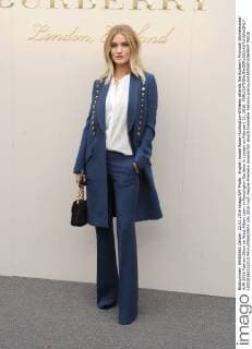 English model Rosie Huntington-Whiteley attends the Burberry Prorsum Womenswear A W 2016 Fashion Show on West Albert Lawn in Kensington Gardens in London on February 22, 2016.  LON20160222210 PAULxTREADWAY