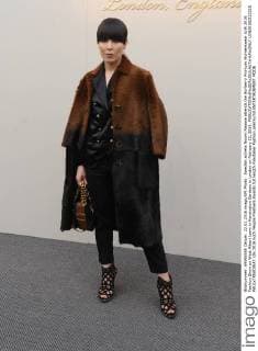 Swedish actress Noomi Rapace attends the Burberry Prorsum Womenswear A W 2016 Fashion Show on West Albert Lawn in Kensington Gardens in London on February 22, 2016.  LON20160222215 PAULxTREADWAY