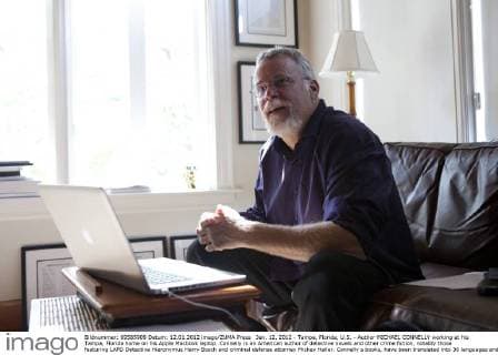Jan. 12, 2012 - Tampa, Florida, U.S. - Author MICHAEL CONNELLY working at his Tampa, Florida home on his Apple Macbook laptop. Connelly is an American author of detective novels and other crime fiction, notably those featuring LAPD Detective Hieronymus Harry Bosch and criminal defense attorney Mickey Haller. Connelly s books, have been translated into 36 languages and garnered him many awards. - ZUMAl43_
