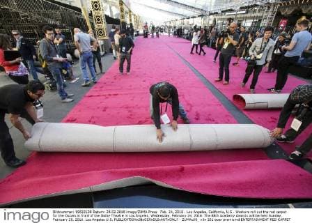 Feb. 24, 2016 - Los Angeles, California, U.S - Workers roll out the red carpet for the Oscars in front of the Dolby Theatre in Los Angeles, Wednesday, February 24, 2016. The 88th Academy Awards will be held Sunday, February 28, 2016. Los Angeles U.S. - ZUMAc68_