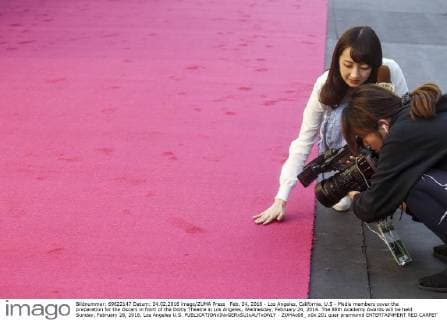 Feb. 24, 2016 - Los Angeles, California, U.S - Media members cover the preparation for the Oscars in front of the Dolby Theatre in Los Angeles, Wednesday, February 24, 2016. The 88th Academy Awards will be held Sunday, February 28, 2016. Los Angeles U.S. - ZUMAc68_