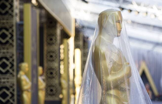 LOS ANGELES, Feb. 25, 2016 -- Photo taken on Feb. 25, 2016 shows a Statue of the Oscar covered by plastic cloth at the entrance of the Dolby Theater in Los Angeles, the United States. The 88th Academy Awards will be held on Feb. 28. ) U.S.-LOS ANGELES-OSCARS-PREPARATION YangxLei 