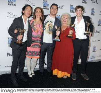 February 27, 2016 - Santa Monica, CA, United States - 27 February 2016 - Santa Monica, California - Justin Chan, Robyn Fairchild, Trey Edward Shults, Krisha Fairchild, Wilson Smith. 31st Annual Film Independent Spirit Awards - Press Room held at the Santa Monica Pier. Photo Credit: Santa Monica United States - ZUMAs123