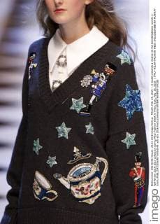 MILAN, Feb. 28, 2016 -- A model presents a creation at the Dolce&Gabbana women s Fall-Winter 2016-2017 collection during Milan Fashion Week in Milan, Italy, Feb. 28, 2016. ) ITALY-MILAN-FASHION WEEK-DOLCE&GABBANA-RUNWAY JinxYu 