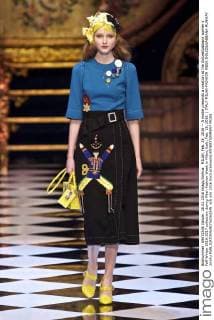 MILAN, Feb. 28, 2016 -- A model presents a creation at the Dolce&Gabbana women s Fall-Winter 2016-2017 collection during Milan Fashion Week in Milan, Italy, Feb. 28, 2016. ) ITALY-MILAN-FASHION WEEK-DOLCE&GABBANA-RUNWAY JinxYu 