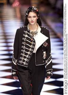 MILAN, Feb. 28, 2016 -- A model presents a creation at the Dolce&Gabbana women s Fall-Winter 2016-2017 collection during Milan Fashion Week in Milan, Italy, Feb. 28, 2016. ) ITALY-MILAN-FASHION WEEK-DOLCE&GABBANA-RUNWAY JinxYu 